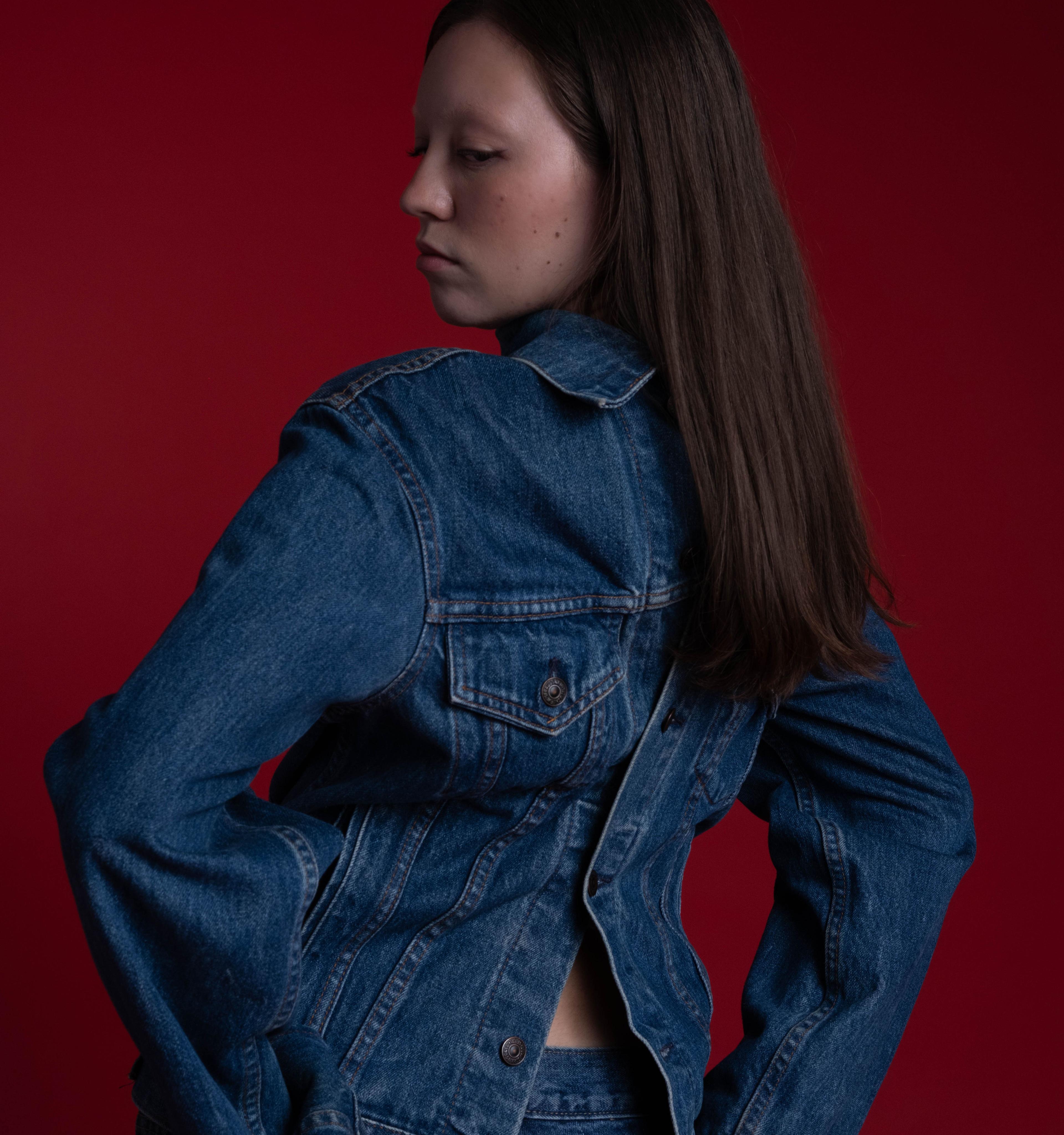 Beacasso's studio portrait of a woman in denim on the Fujifilm X-T50