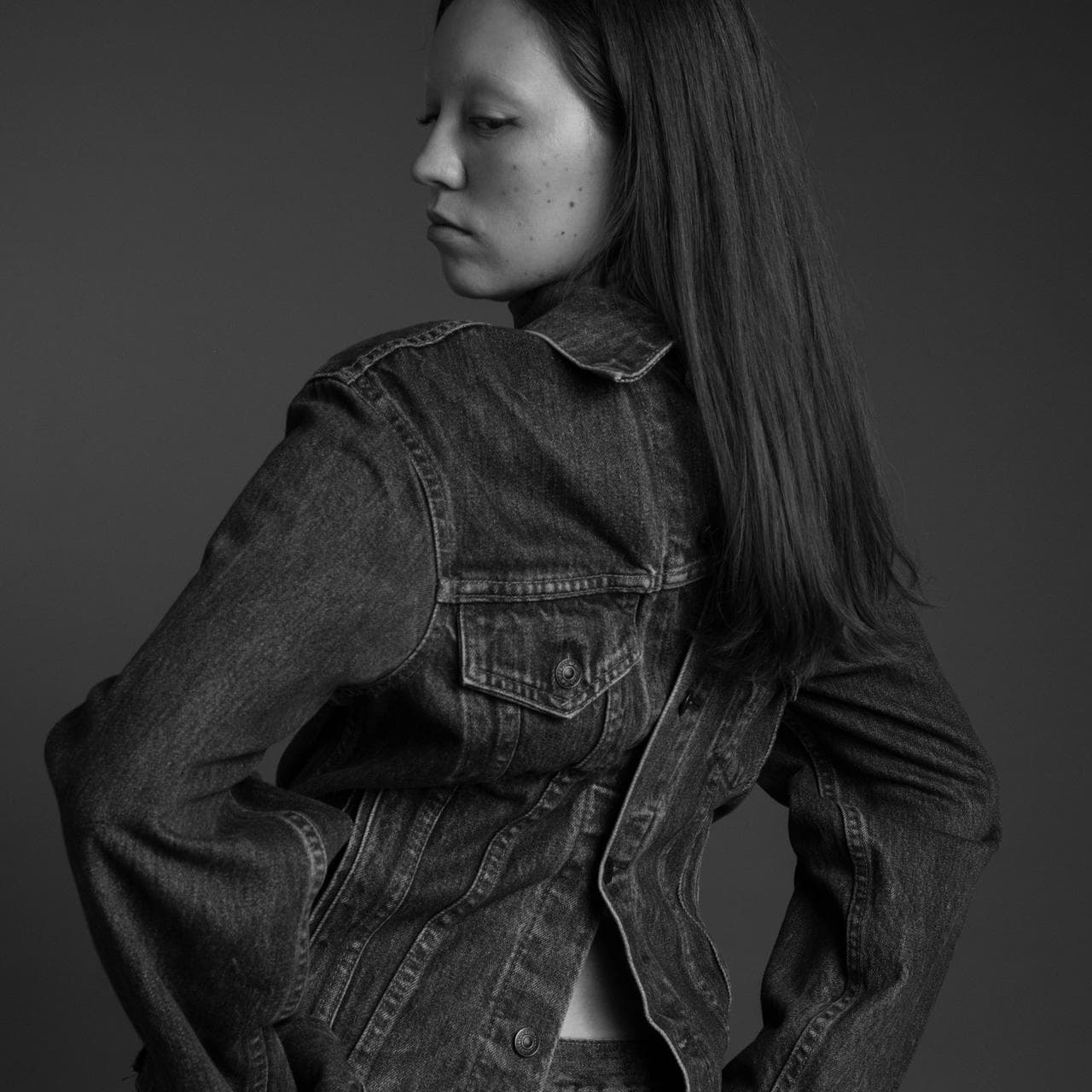 Beacasso's studio portrait of a woman in denim on the Fujifilm X-T50