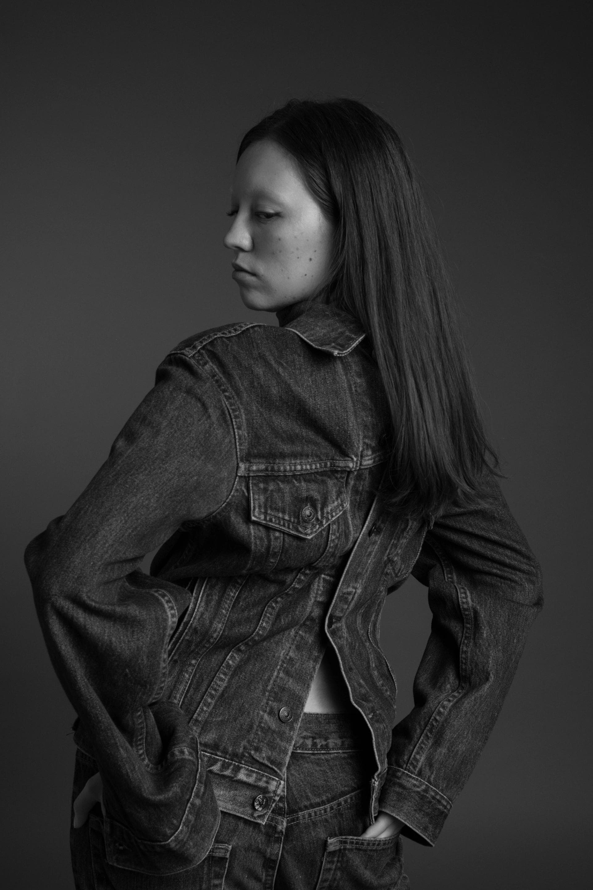 Beacasso's studio portrait of a woman in denim on the Fujifilm X-T50